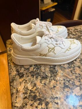 Gucci White Sneakers with Gold GG Motif - Women's